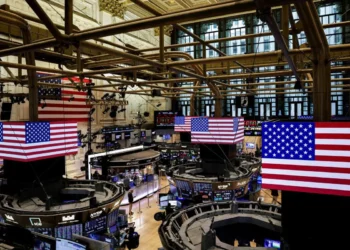 Wall Street Cetak Rekor Baru Dipicu Reli Saham Chip & AI